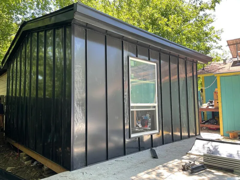 Black standing seam metal wall panels for Metal Roof Installation in St. Rose