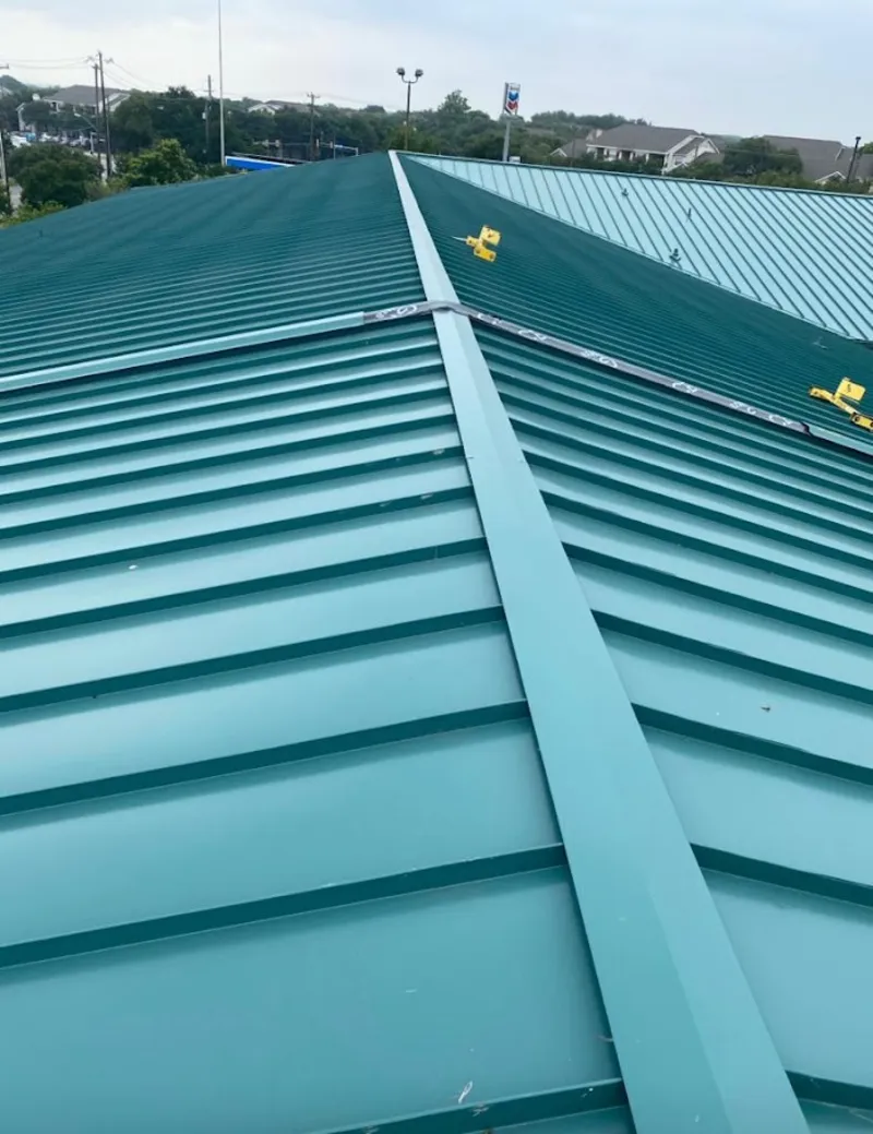 Green commercial metal roof ridge and valley for Metal Roof Repair in St. Rose