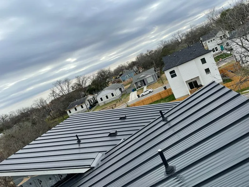 Standing seam metal roof panels with vents for Skylight Repair in St. Rose